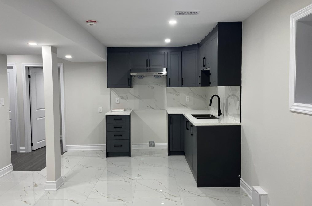 Basement Kitchen by Eagle Eye Home Renovations