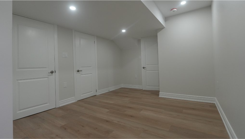 Basement Living Space by Eagle Eye Home Renovations