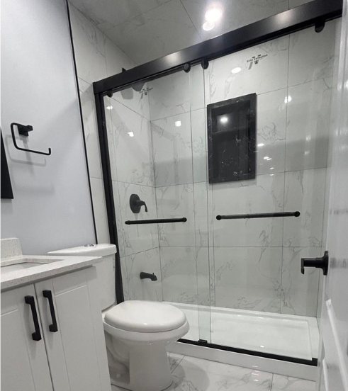 Marble Basement Bath by Eagle Eye Home Renovations