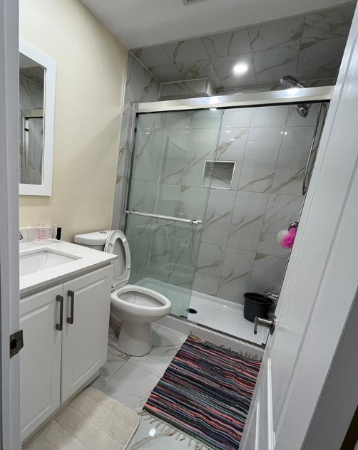 Basement Bathroom by Eagle Eye Home Renovations