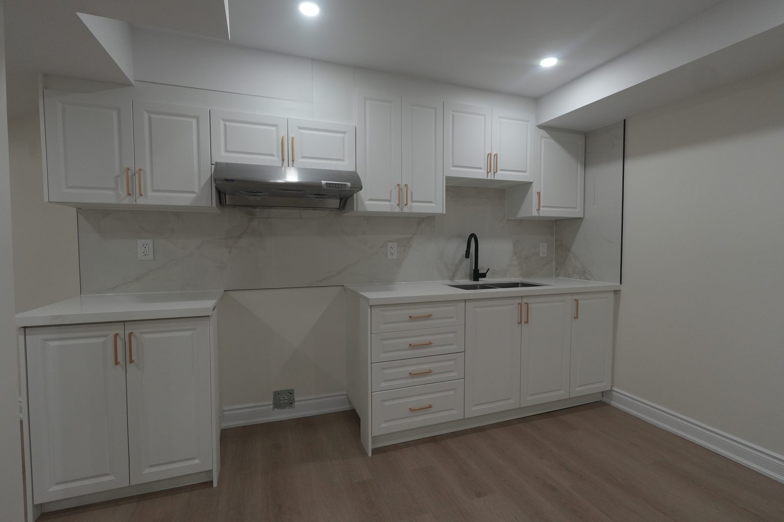 Basement Kitchen — Marble Backsplash by Eagle Eye Home Renovations