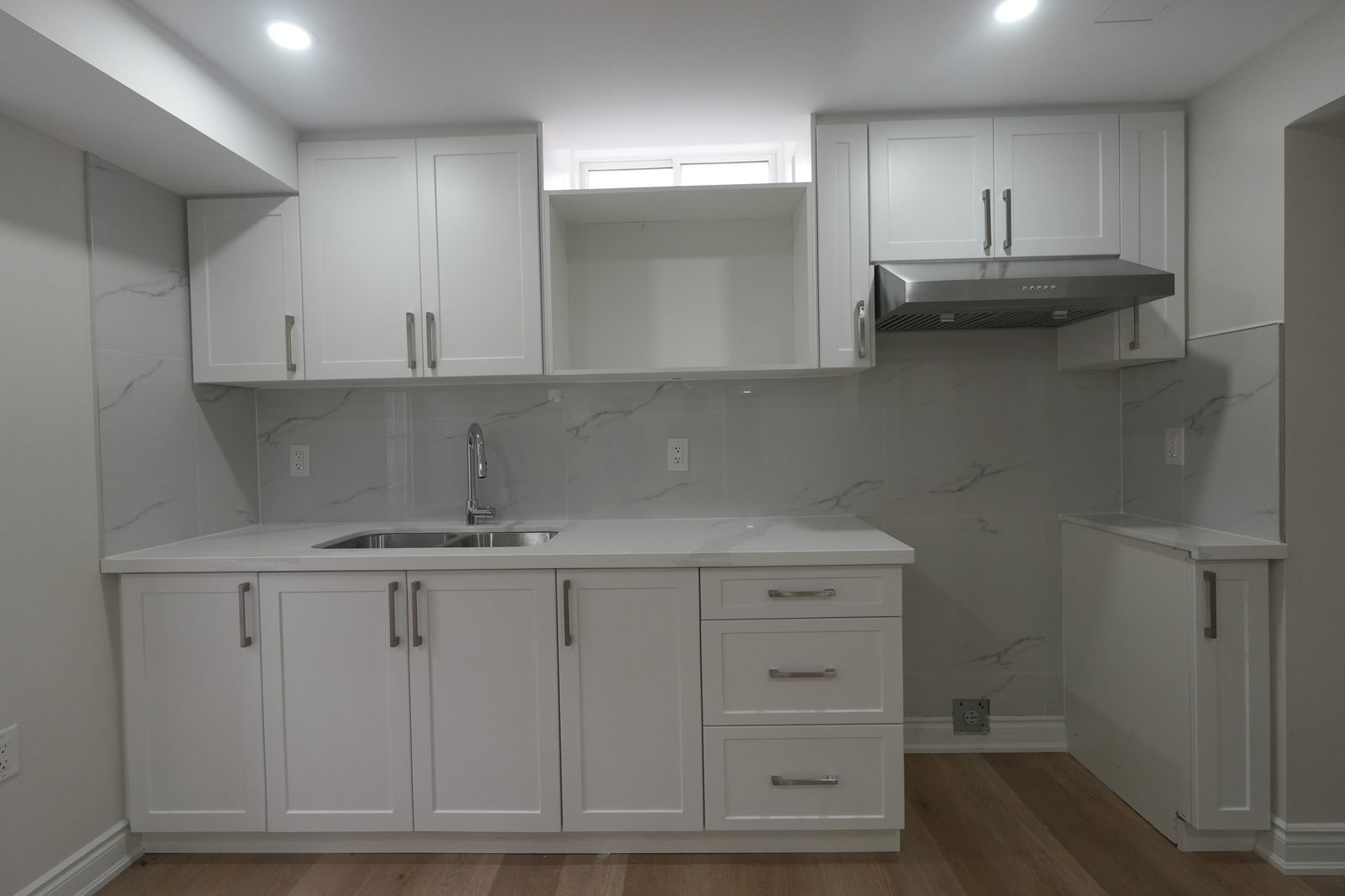 Basement Kitchen — Bright & Open by Eagle Eye Home Renovations
