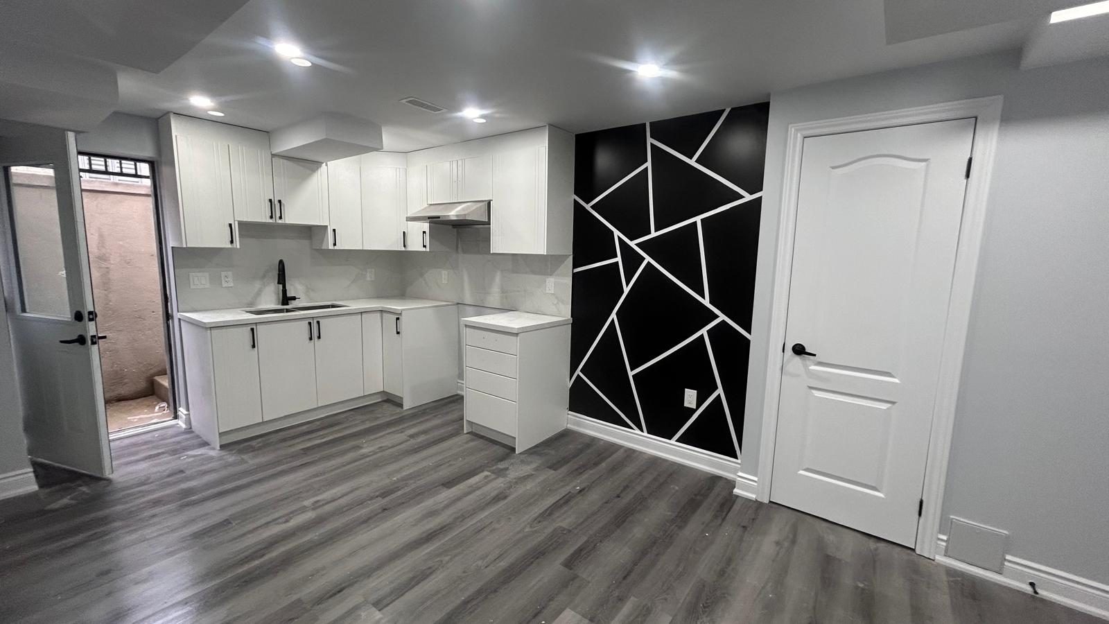 Basement Kitchen — Feature Wall by Eagle Eye Home Renovations