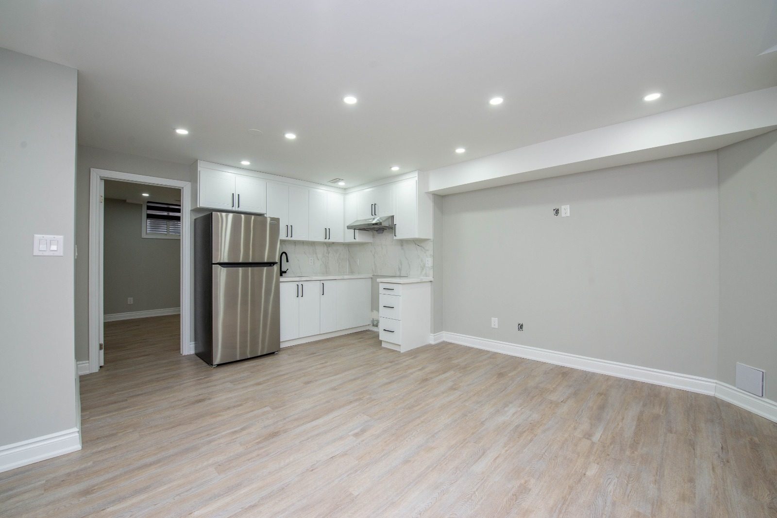 Basement Kitchen — Bright White by Eagle Eye Home Renovations