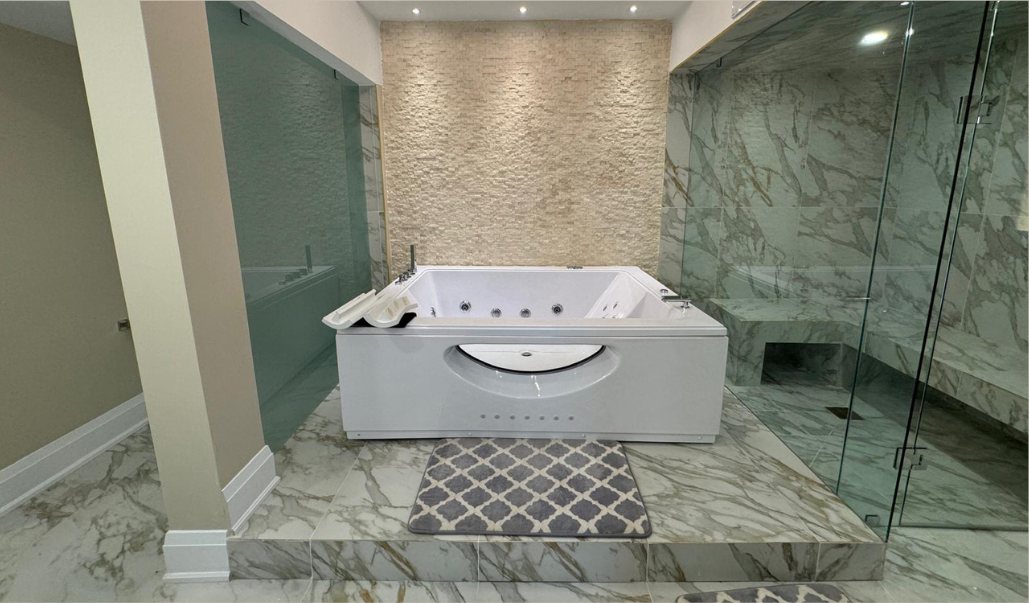Jetted Tub & Glass Shower by Eagle Eye Home Renovations