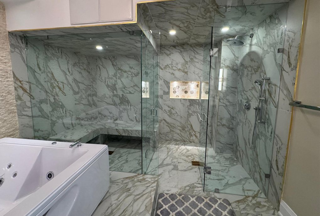 Spa Bath & Rain Shower by Eagle Eye Home Renovations