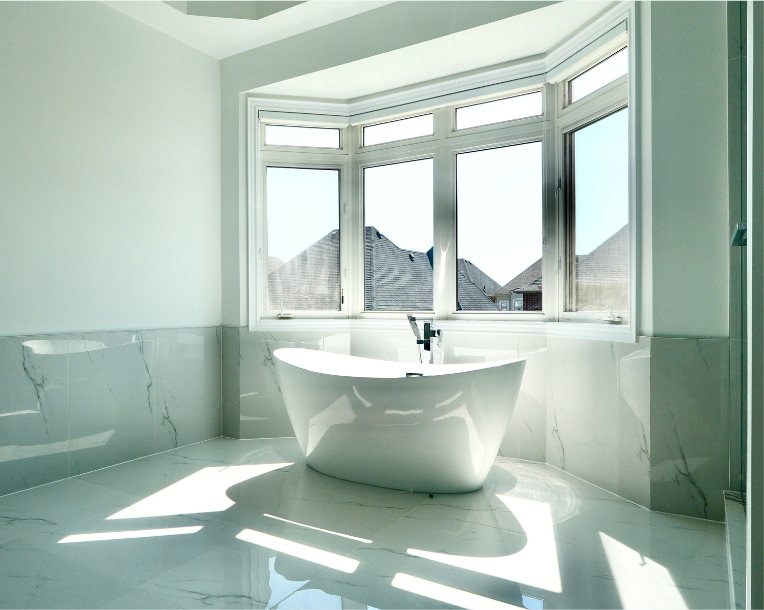Bright Master Bathroom by Eagle Eye Home Renovations
